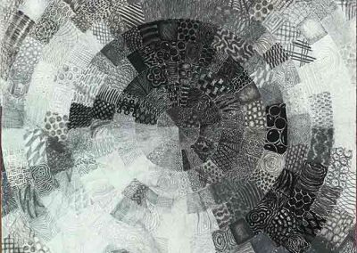 Abstract circular artwork in black and white.