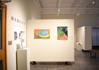 The beginning of the memoirs exhibition showing two of the pieces - an elephant and a peacock.